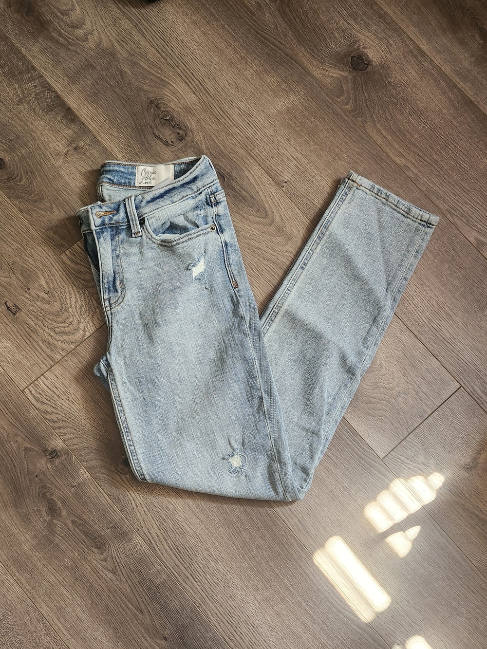 Light Blue High-Rise Distressed Women’s Jeans